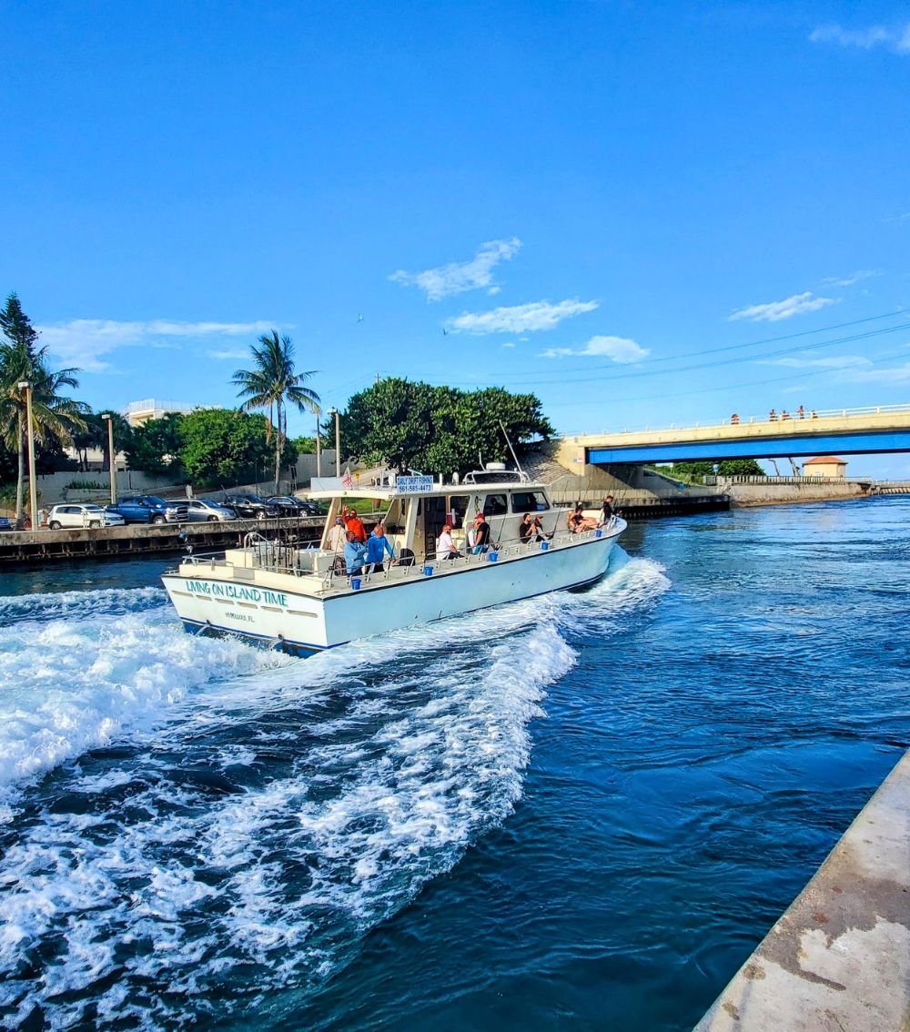 Fishing boat leaving the Intracoastal at the Boynton Inlet.