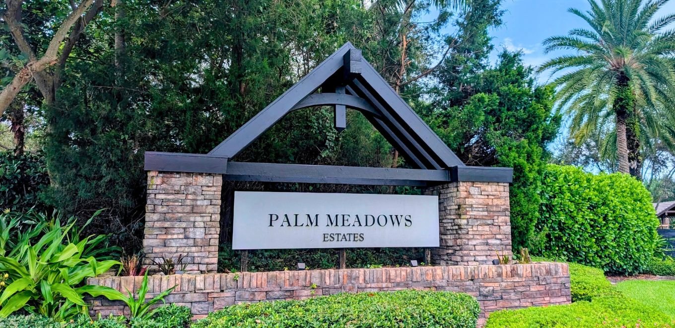 Entrance sign at Palm Meadows Estates in West Boynton Beach, Florida